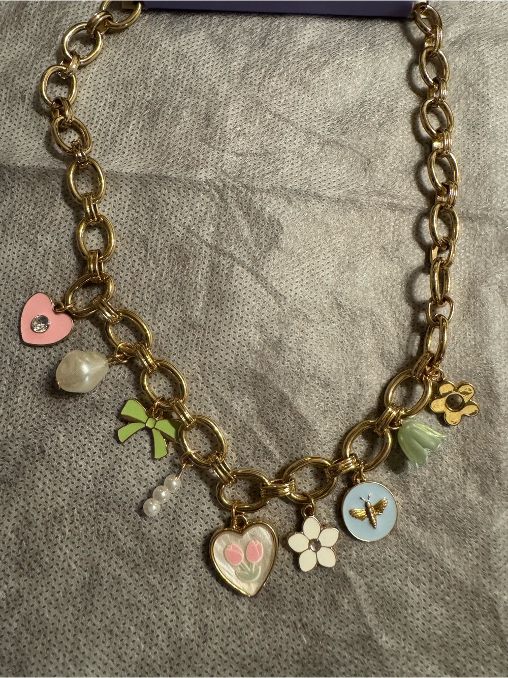 Claire's Gold Charm Necklace with Pastel Pink, Green, Blue and Cream Accents